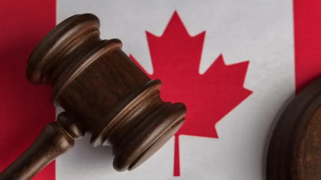 Judge's gavel on Canadian flag