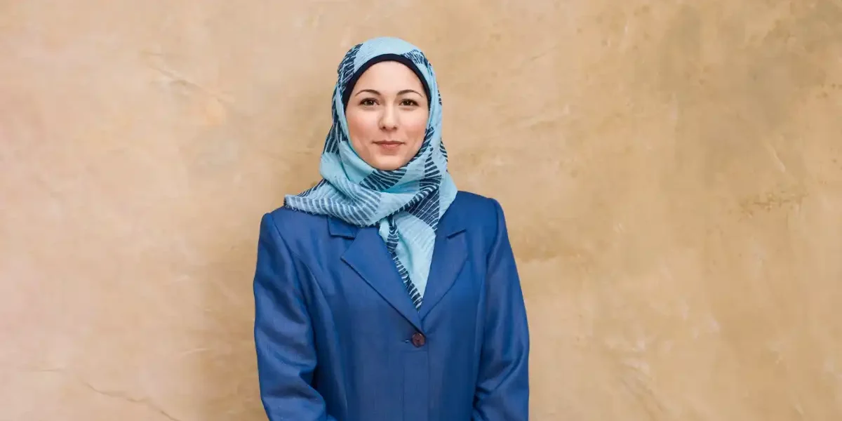 A muslim woman wearing a hijab.