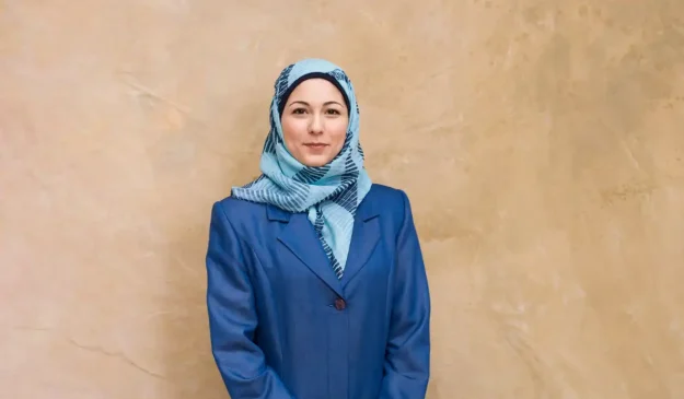 A muslim woman wearing a hijab.