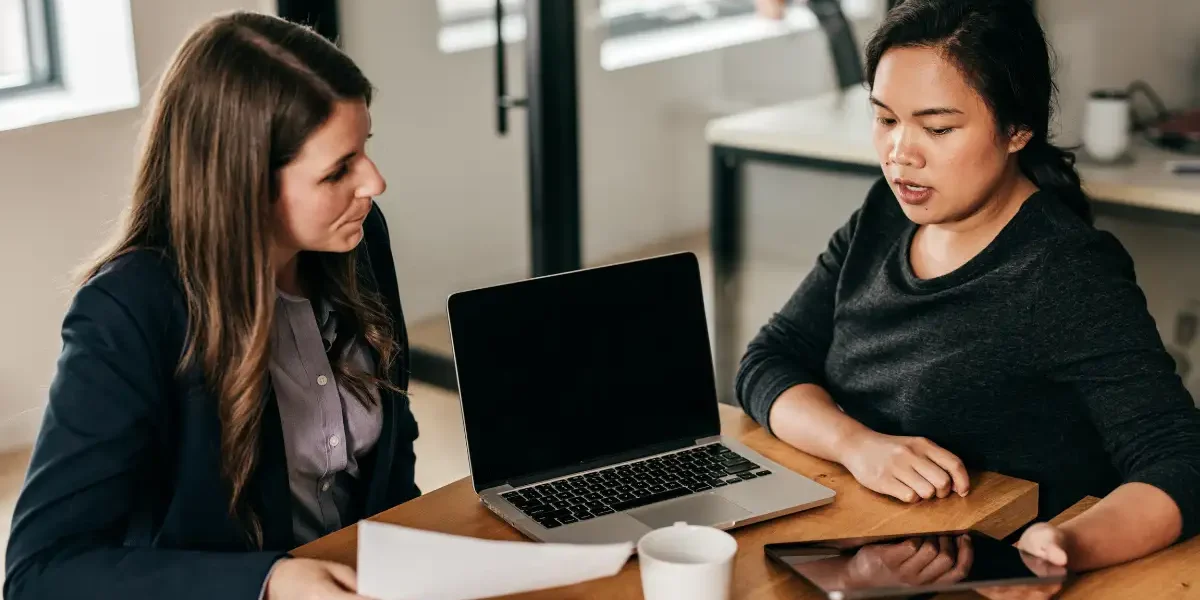 A spouse talking to a family lawyer.