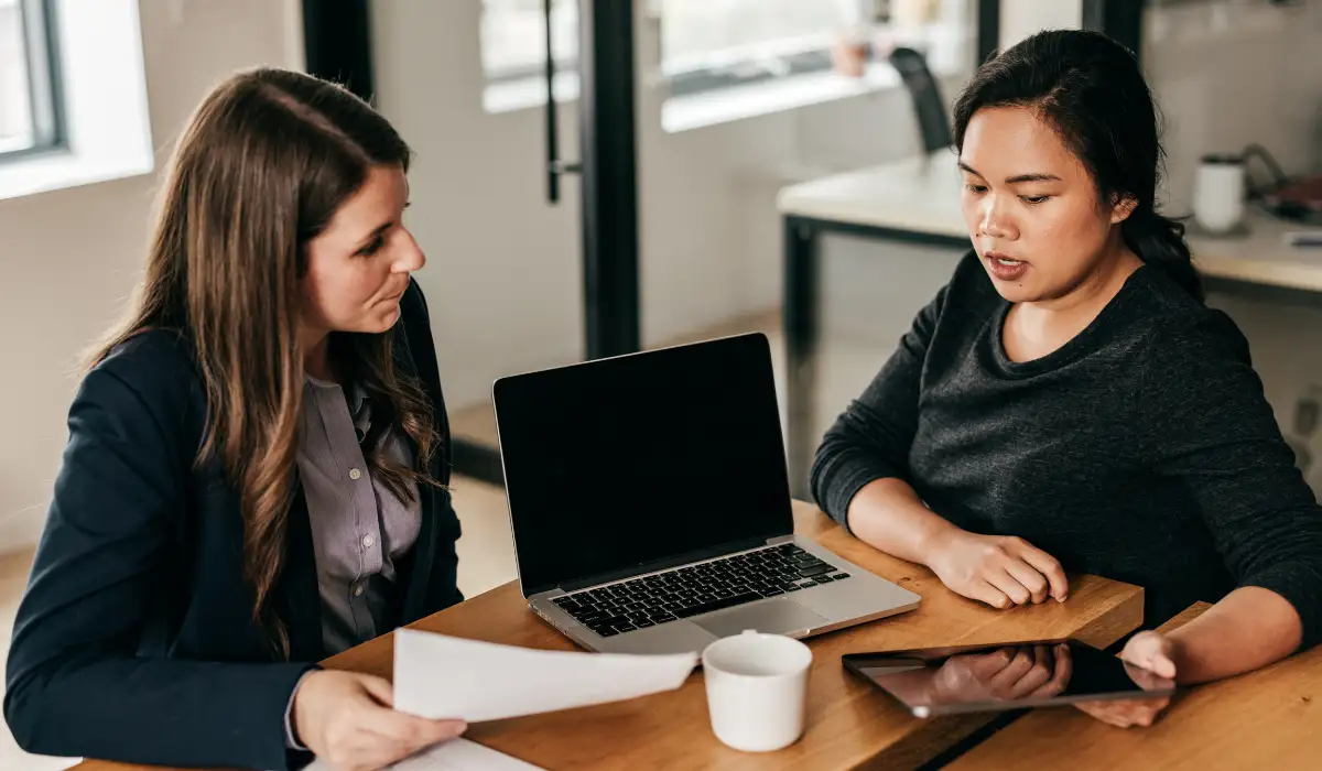 A spouse talking to a family lawyer.
